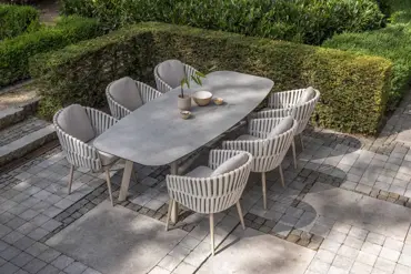 Manolo tafel 240x103cm met 6 Eva stoelen sfeer 1, 4 Seasons Outdoor, Tuinmeubels